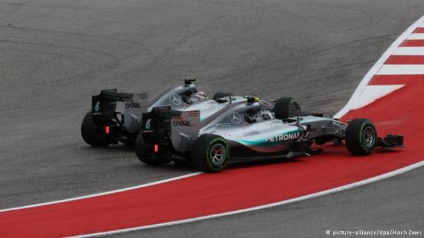 Lewis pushing Nico wide going in Turn 1 of lap 1